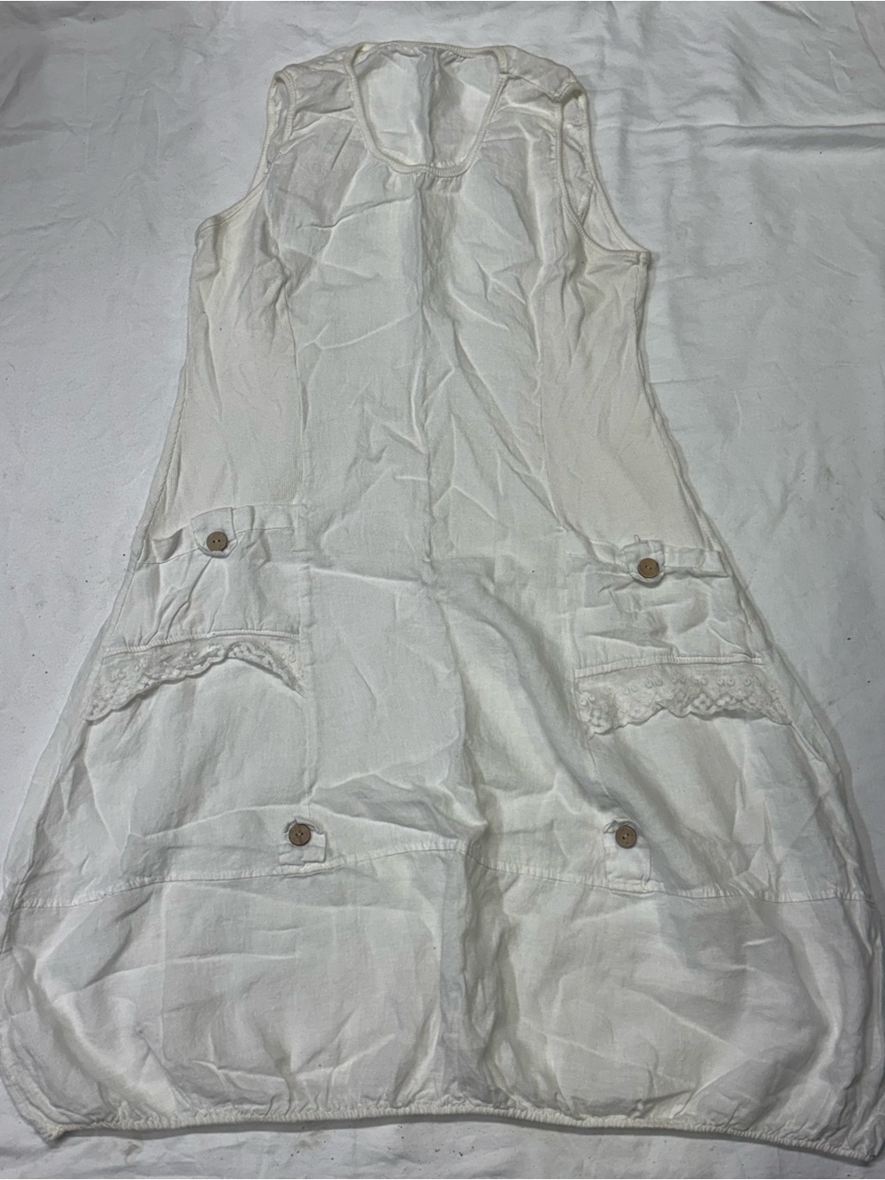 Sleeveless White Lace-Pocket Tunic